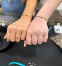 Placeholder photo of layered gold permanent jewelry chains on a wrist.